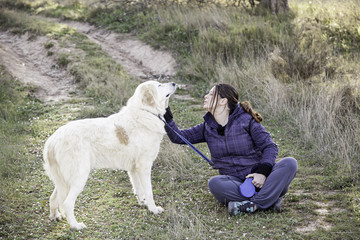 Woman with dog mastiff