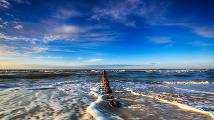 Baltic Sea and the breakwater at dusk. HDR - high dynamic range