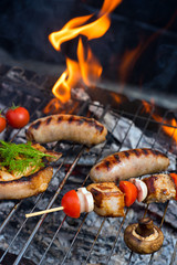 Grilling sausages on barbecue grill. 