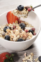 diet weight loss breakfast, healthy food with muesli , strawberry and blueberry