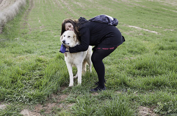 Woman with dog mastiff field, nature and animals