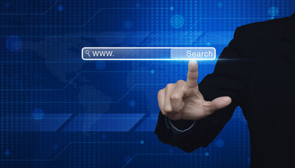 Businessman hand pressing search www button on digital world map