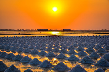 sunset over the salt field in thailand
