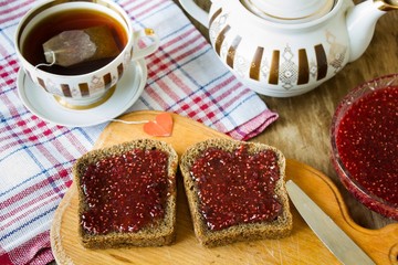 Raspberry jam and blak bread