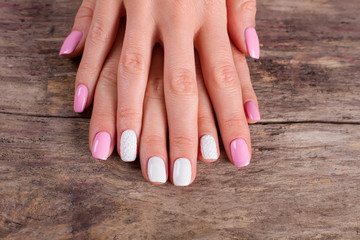 Manicure on vintage background.