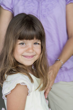 Caucasian girl smiling in formal wear