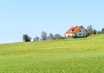 Obraz premium house and meadow