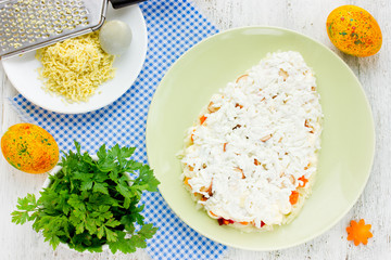 Preparation beautiful Easter salad in shape egg