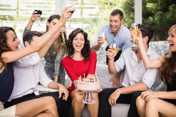 Woman celebrating her birthday with friends