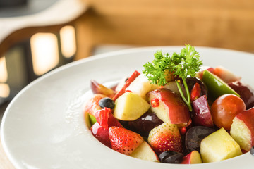 fruits salad in plate on table