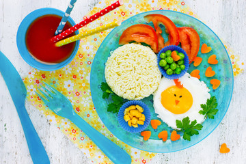 Easter branch or breakfast for children egg colorful vegetables