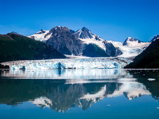 Columbia Glacier is mirrored to the Sea, Prince William Sound, Alaska, USA, America. View cruise . - obrazy, fototapety, plakaty