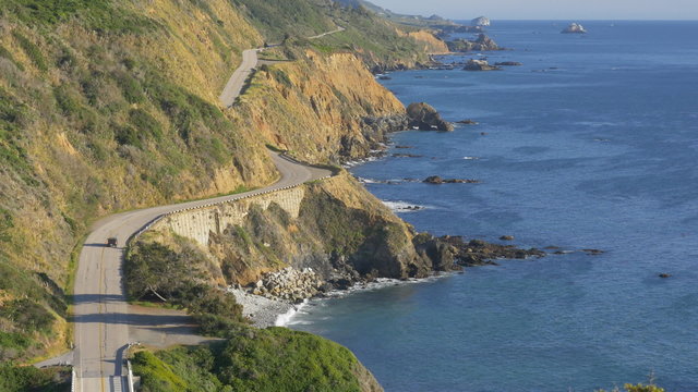 Zooming in view from above of California Highway 1 (aka Cabrillo Highway or Pacific Coast Highway) in the Big Sur area of Central California