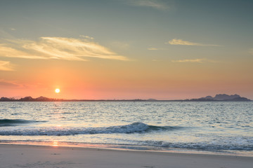 Fototapeta premium Sunrise on beach with beautiful sky
