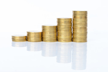 Stack of golden coins isolated on white background