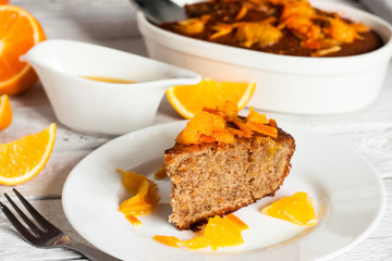 a piece of orange pie on the white plate