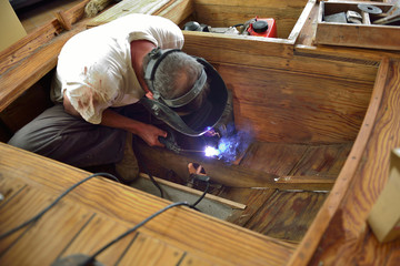 Workers in a Boat Carpentry Workshop