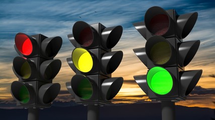 Traffic lights, with sunset sky background