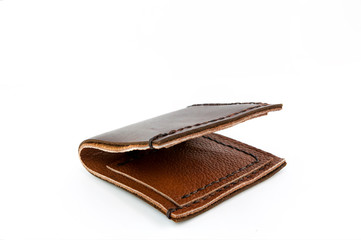 Leather brown wallet handmade isolated on white background