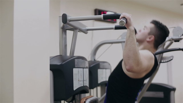 Weight loss: Man is exercising in gym