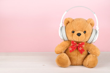 Teddy Bear with headphones with copy space