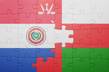 puzzle with the national flag of paraguay and oman