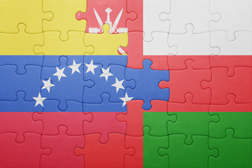 puzzle with the national flag of venezuela and oman