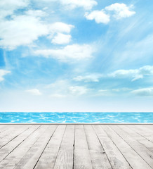 Wooden pier, exotic sea and the  blue sky
