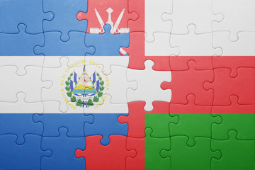 puzzle with the national flag of el salvador and oman