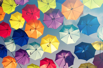 Colorful umbrellas background. Colourful umbrellas urban street decoration.