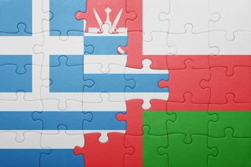 puzzle with the national flag of greece and oman