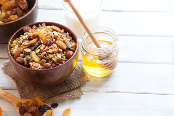 Granola in a wooden bowl.