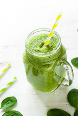 Healthy green smoothie in jar.