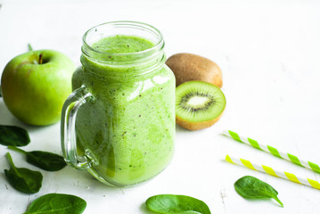 Healthy green smoothie in jar.