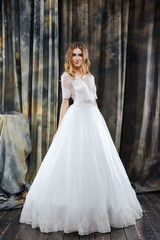 Fototapeta premium pretty bride in white wedding dress