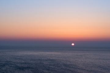 Obraz premium Sunset sky over tropical sea. Vintage filter