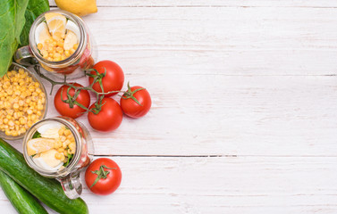 Homemade healthy salad in glass jar. Vegetarian concept. Background.