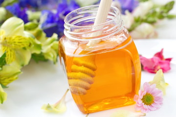 Flower honey in glass jars