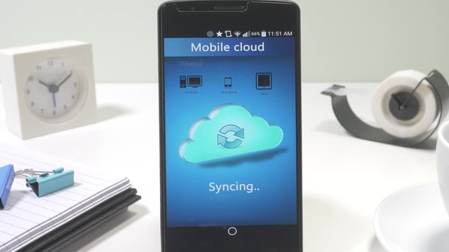 Using a mobile cloud app on a modern smartphone device.