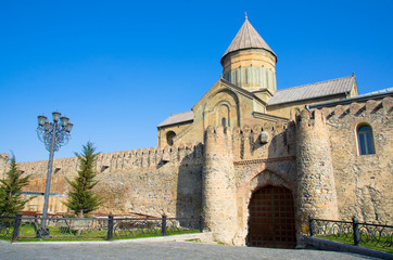 Fototapeta na wymiar The Svetitskhoveli Cathedral 11th century in Mtskheta in summer day. Mtskheta one of the oldest cities of Georgia