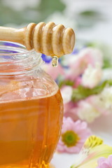 Flower honey in glass jars