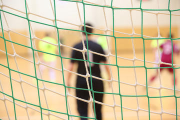 Rear view of futsal goalkeeper