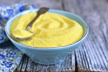 Dried polenta in a blue vintage bowl.