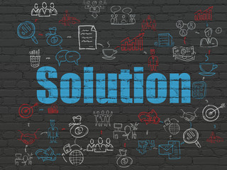 Business concept: Solution on wall background