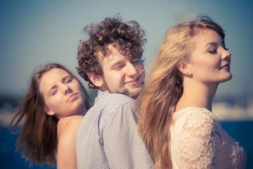 Obraz premium Group friends boy two girls having fun outdoor