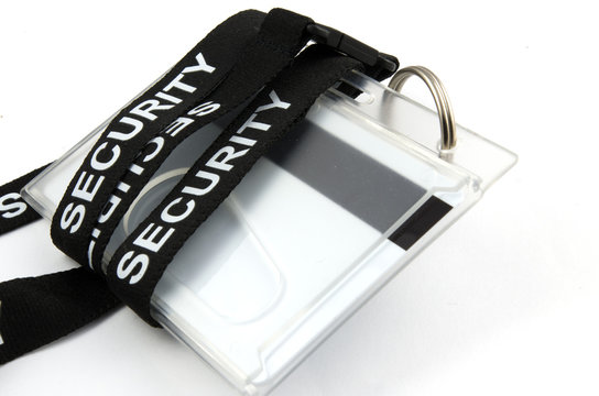 a black and white security camera with a black and white logo - security pass