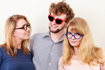 Happy friends man and women in glasses.