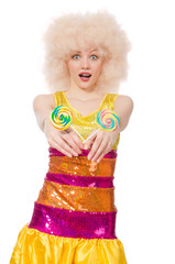 Curly woman holding lolly pop isolated on white