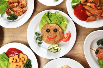 a wide variety of dishes on the table in the children's restaurant