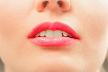 Fototapeta premium Close up of woman pink lips.
